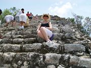 My big Sis Wendy, resting on our way up to the top of the pyramid at Coba, MX